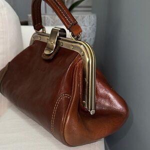 Chic Brown Leather Clutch with Gold Accents